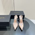 LE CŒUR SLINGBACKS IN PATENT LAMBSKIN