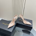 LE CŒUR SLINGBACKS IN PATENT LAMBSKIN