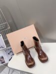 Miu Miu - Vintage-Look Leather Booties